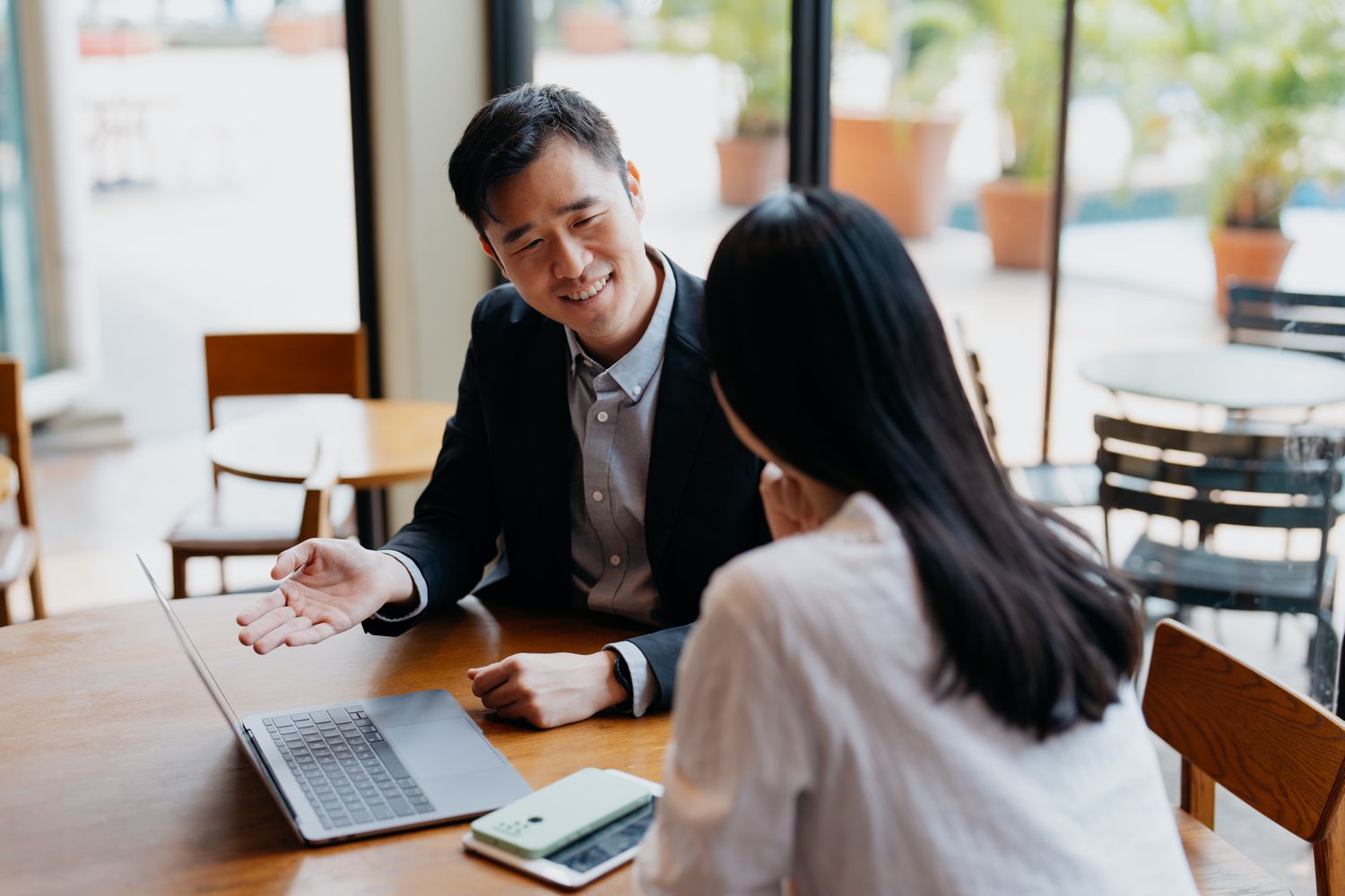 Team members discussing insurance plans
